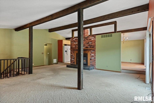 5016 Kinsinger Ln, Pleasant Plains, IL 62677 - unfurnished living room featuring carpet, a chandelier, and a brick fireplace