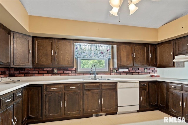 5016 Kinsinger Ln, Pleasant Plains, IL 62677 - kitchen with white dishwasher, under cabinet range hood, light countertops, dark brown cabinetry, and light flooring