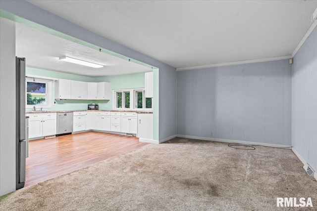7971 Mechanicsburg Rd, Springfield, IL 62707 - unfurnished living room featuring light colored carpet and light wood-type flooring