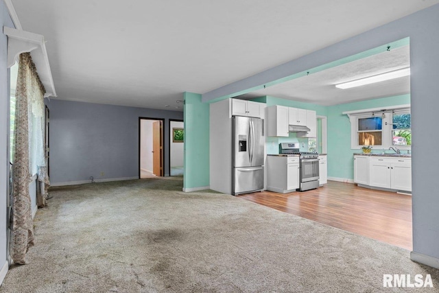 7971 Mechanicsburg Rd, Springfield, IL 62707 - unfurnished living room with light carpet and healthy amount of natural light