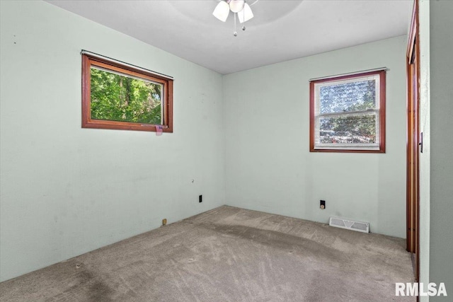 7971 Mechanicsburg Rd, Springfield, IL 62707 - carpeted empty room featuring a ceiling fan