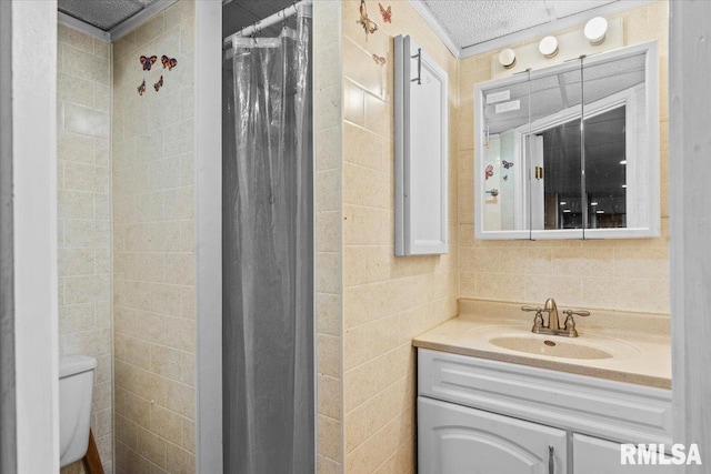 7971 Mechanicsburg Rd, Springfield, IL 62707 - full bathroom with tile walls, vanity, and a shower with shower curtain