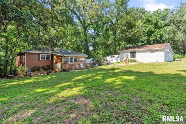 7971 Mechanicsburg Rd, Springfield, IL 62707 - view of yard with an outbuilding and a garage