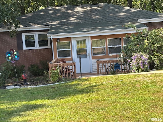 7971 Mechanicsburg Rd, Springfield, IL 62707 - ranch-style house featuring brick siding, roof with shingles, and a front yard