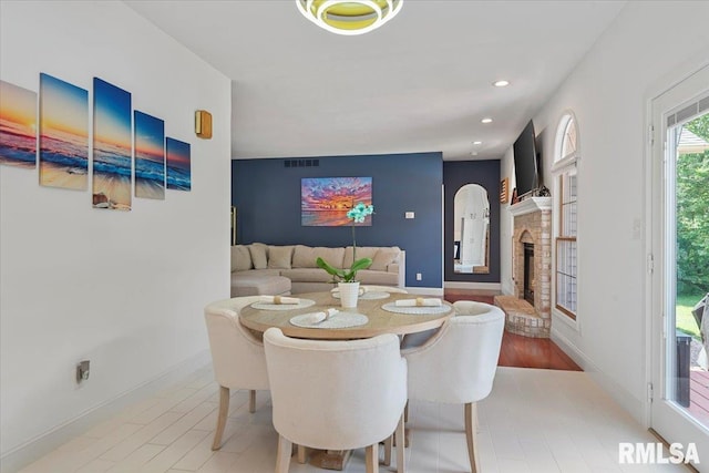 345 Country Towne Rd, Springfield, IL 62712 - dining space with a fireplace and recessed lighting