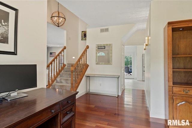 345 Country Towne Rd, Springfield, IL 62712 - entrance foyer with dark wood finished floors, a chandelier, and stairway