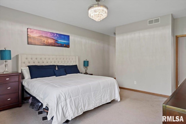 345 Country Towne Rd, Springfield, IL 62712 - carpeted bedroom with baseboards and a chandelier