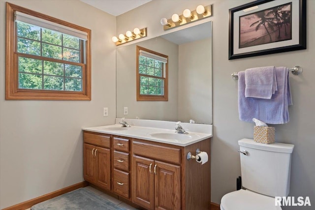 345 Country Towne Rd, Springfield, IL 62712 - bathroom featuring double vanity and toilet