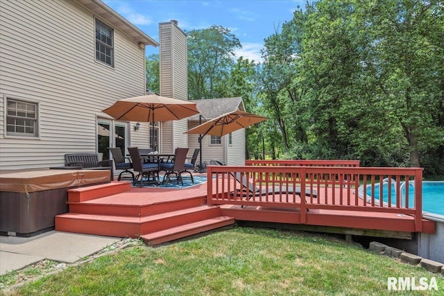 345 Country Towne Rd, Springfield, IL 62712 - deck with a hot tub, an outdoor pool, a yard, and outdoor dining area