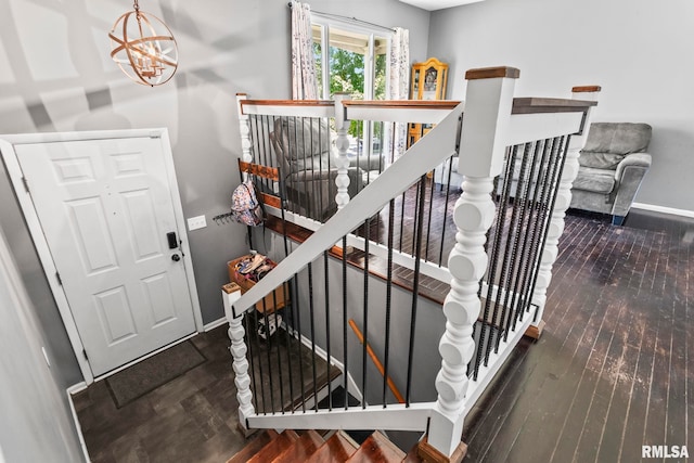 2208 E Black Ave, Springfield, IL 62702 - stairs with wood-type flooring and a chandelier