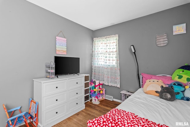 2208 E Black Ave, Springfield, IL 62702 - bedroom with wood finished floors and baseboards