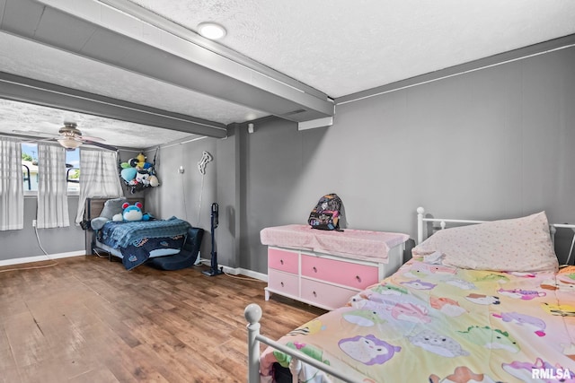 2208 E Black Ave, Springfield, IL 62702 - bedroom with wood finished floors and a textured ceiling