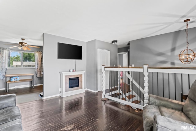 2208 E Black Ave, Springfield, IL 62702 - living area featuring wood-type flooring, ceiling fan, a chandelier, and a premium fireplace