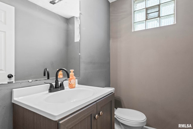 2208 E Black Ave, Springfield, IL 62702 - bathroom featuring vanity and toilet