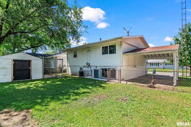 2208 E Black Ave, Springfield, IL 62702 - back of property with a storage unit and a carport