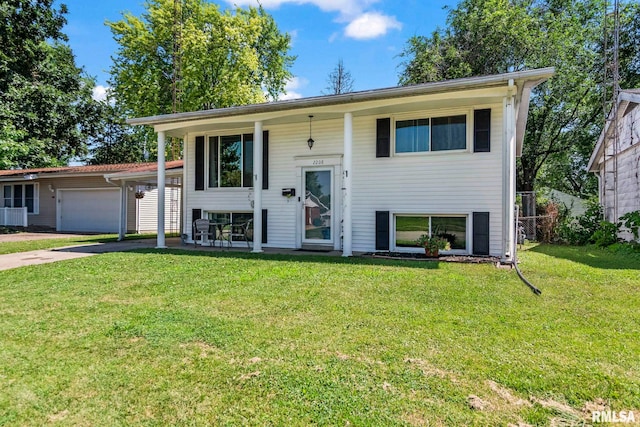 2208 E Black Ave, Springfield, IL 62702 - raised ranch with a front lawn, driveway, and an attached garage