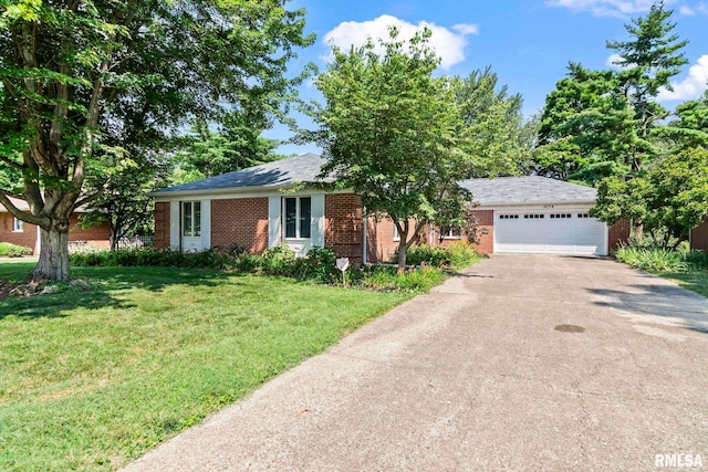 1613 Denison Dr, Springfield, IL 62704 - single story home with brick siding, concrete driveway, a front yard, and an attached garage