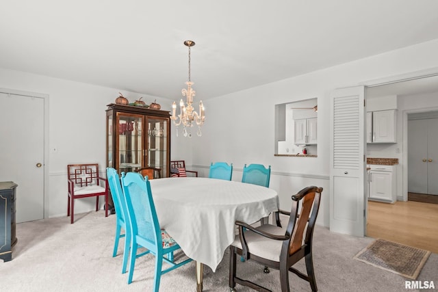 1613 Denison Dr, Springfield, IL 62704 - dining room with a chandelier and light colored carpet