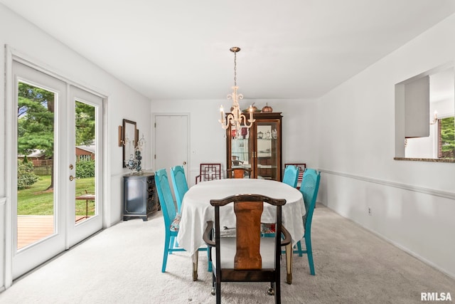 1613 Denison Dr, Springfield, IL 62704 - carpeted dining area with a chandelier