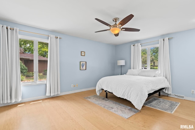 1613 Denison Dr, Springfield, IL 62704 - bedroom with light wood-style floors and ceiling fan