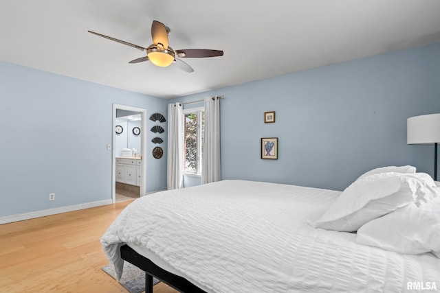 1613 Denison Dr, Springfield, IL 62704 - bedroom with light wood-style floors, connected bathroom, and ceiling fan