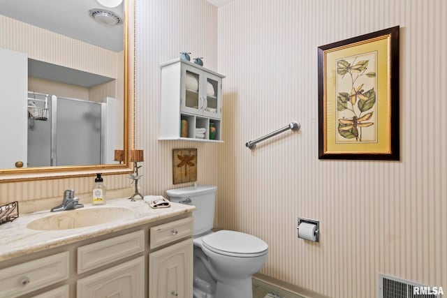 1613 Denison Dr, Springfield, IL 62704 - bathroom with wallpapered walls, vanity, and a stall shower