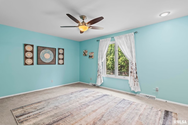 1613 Denison Dr, Springfield, IL 62704 - carpeted spare room featuring ceiling fan and baseboards