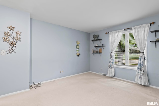 1613 Denison Dr, Springfield, IL 62704 - carpeted empty room featuring baseboards