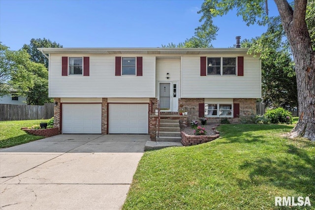 84 Chukar Dr, Chatham, IL 62629 - raised ranch featuring brick siding, concrete driveway, and an attached garage