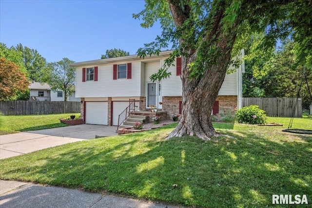 84 Chukar Dr, Chatham, IL 62629 - split foyer home with brick siding, driveway, and an attached garage