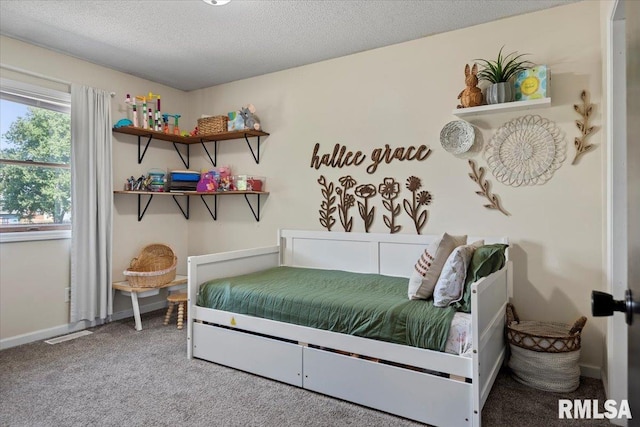 84 Chukar Dr, Chatham, IL 62629 - carpeted bedroom with a textured ceiling and baseboards