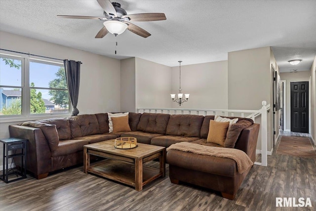 84 Chukar Dr, Chatham, IL 62629 - living area featuring a chandelier, dark wood-style floors, a ceiling fan, and a textured ceiling