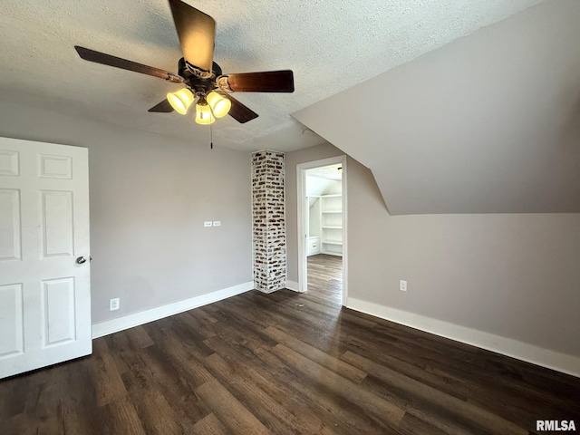 833 Willard St, Galesburg, IL 61401 - additional living space featuring dark wood-style flooring, a textured ceiling, and a ceiling fan