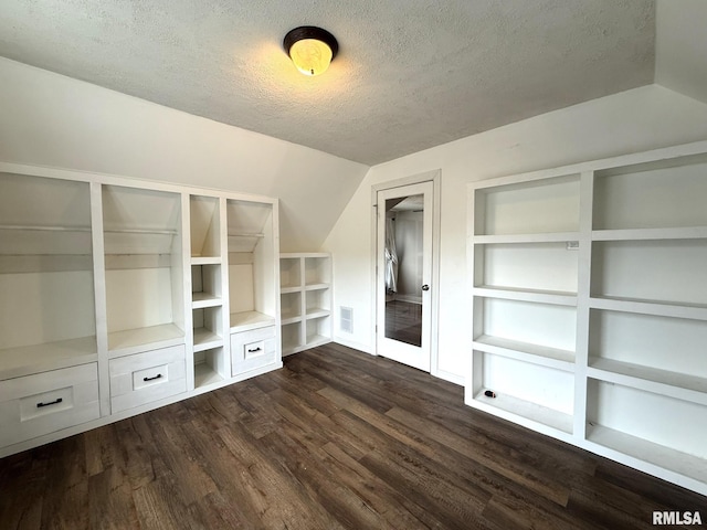 833 Willard St, Galesburg, IL 61401 - additional living space featuring a textured ceiling, dark wood-style floors, built in features, and lofted ceiling
