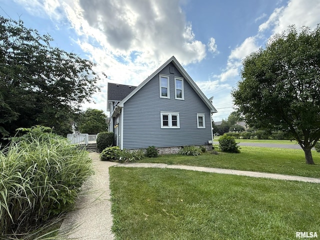833 Willard St, Galesburg, IL 61401 - view of property exterior featuring a yard and a deck