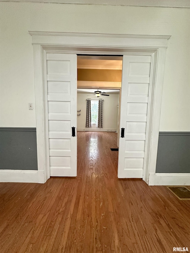231 N Webster Ave, Jacksonville, IL 62650 - hall featuring wood finished floors and baseboards