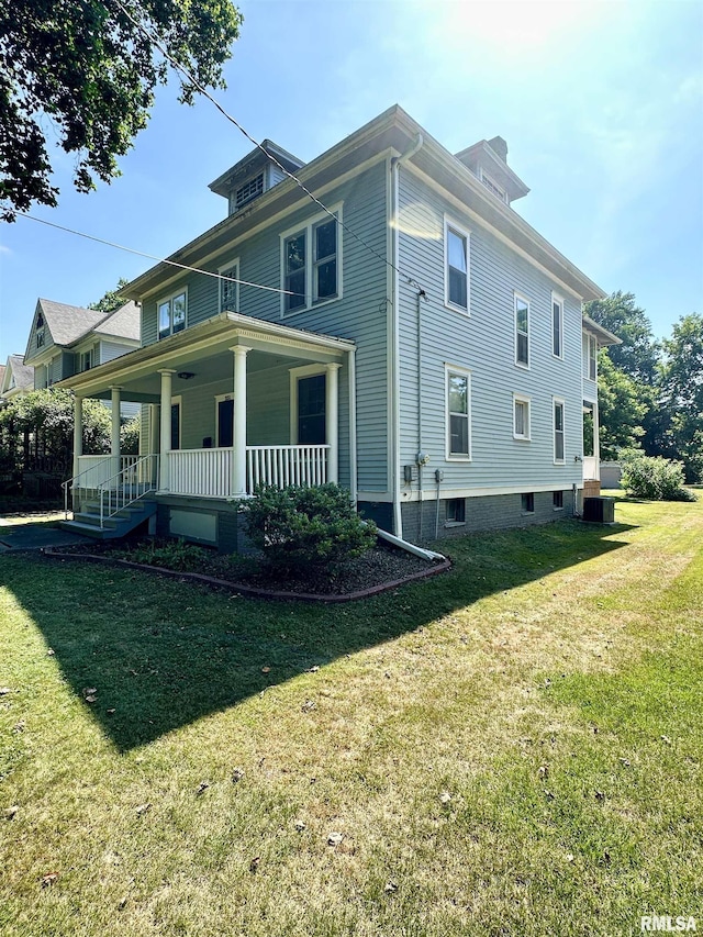 231 N Webster Ave, Jacksonville, IL 62650 - view of side of property featuring a porch and a lawn