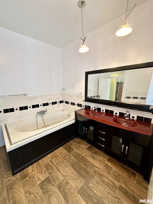 231 N Webster Ave, Jacksonville, IL 62650 - bathroom featuring double vanity and a garden tub