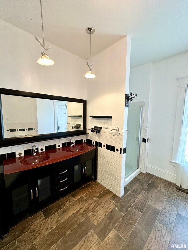 231 N Webster Ave, Jacksonville, IL 62650 - bathroom with double vanity and a shower stall