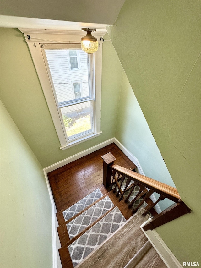 231 N Webster Ave, Jacksonville, IL 62650 - stairs featuring wood finished floors and vaulted ceiling