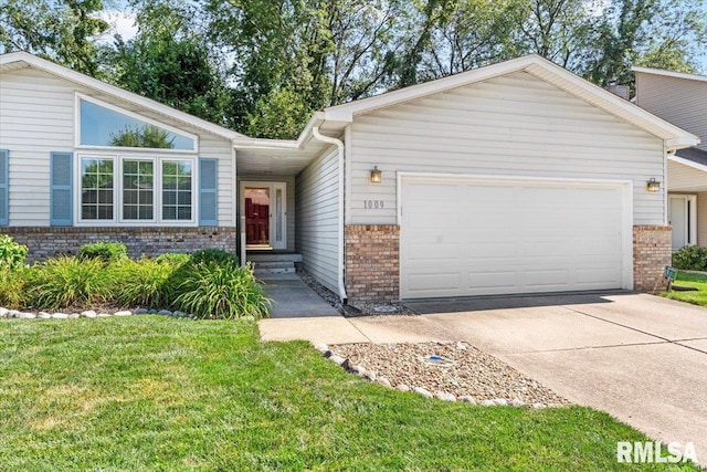 1009 Rickard Ct, Springfield, IL 62704 - view of front of house with brick siding, an attached garage, concrete driveway, and a front yard