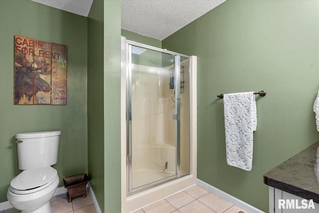 1009 Rickard Ct, Springfield, IL 62704 - full bathroom featuring tile patterned floors, a stall shower, vanity, and a textured ceiling