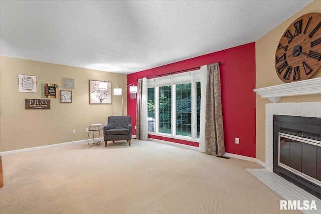 1009 Rickard Ct, Springfield, IL 62704 - sitting room featuring carpet flooring, a brick fireplace, and a textured ceiling