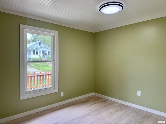 778 E Grove St, Galesburg, IL 61401 - empty room with wood finished floors and baseboards