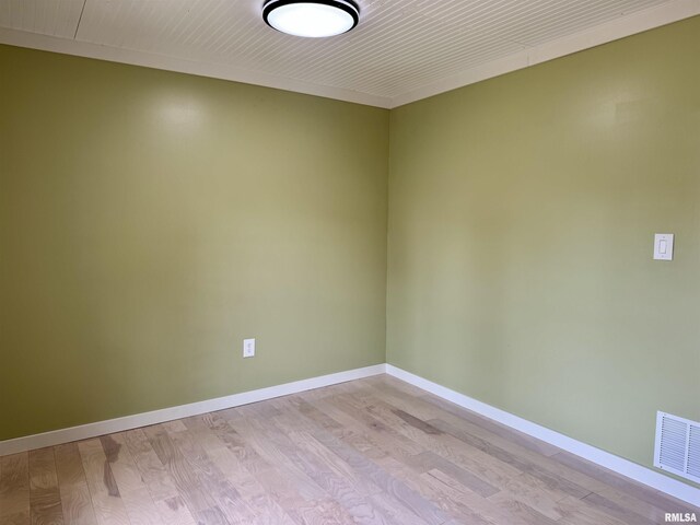 778 E Grove St, Galesburg, IL 61401 - empty room with light wood-style flooring and baseboards
