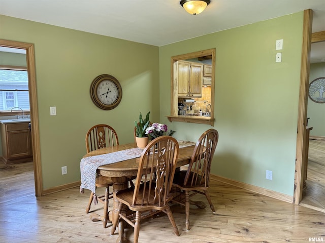 778 E Grove St, Galesburg, IL 61401 - dining space with light wood-type flooring