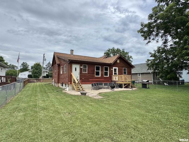 778 E Grove St, Galesburg, IL 61401 - rear view of property featuring entry steps, a fenced backyard, and a chimney