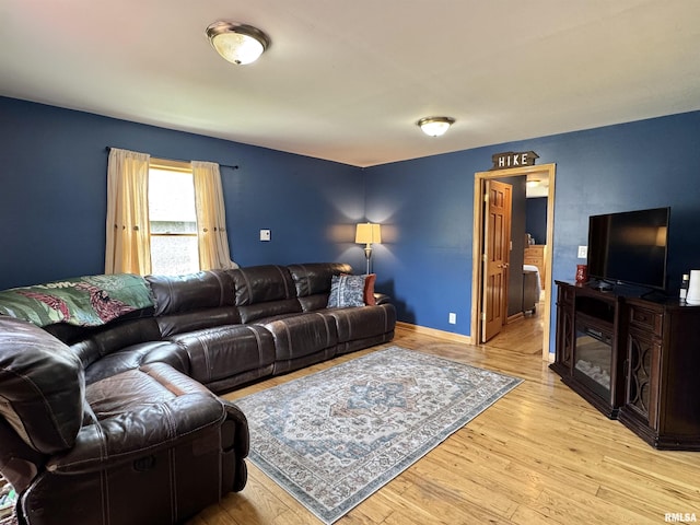 778 E Grove St, Galesburg, IL 61401 - living room with light wood-style floors and baseboards