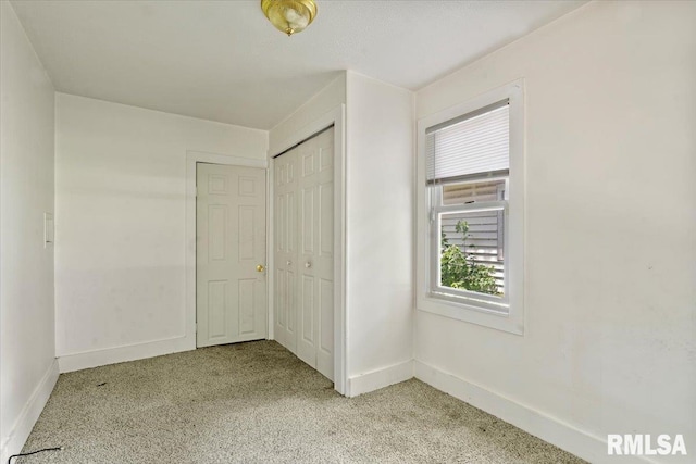 1310 Ledlie Ave, Springfield, IL 62702 - unfurnished bedroom featuring light carpet and a closet
