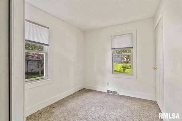 1310 Ledlie Ave, Springfield, IL 62702 - empty room featuring healthy amount of natural light and carpet